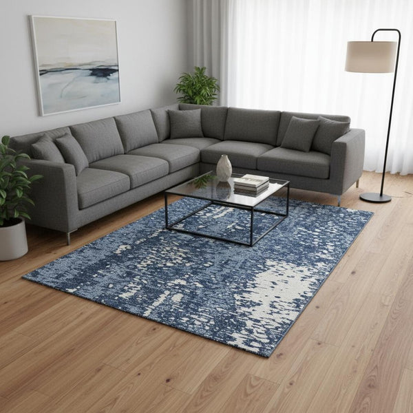 HomeRoots 9' X 12' Denim Blue Ivory Abstract Rug – Washable, UV Protected, Durable for High Traffic Spaces 675437