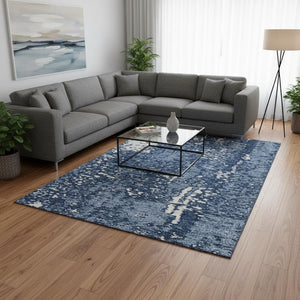 HomeRoots 10' X 14' Denim Blue & Ivory Abstract Area Rug - Washable, UV Protected, Stain Resistant for Busy Homes 675438