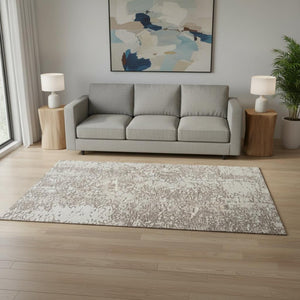 HomeRoots 5' X 8' Abstract Taupe and Ivory Area Rug - Stain Resistant, UV Protected, Modern Design for Homes 675470