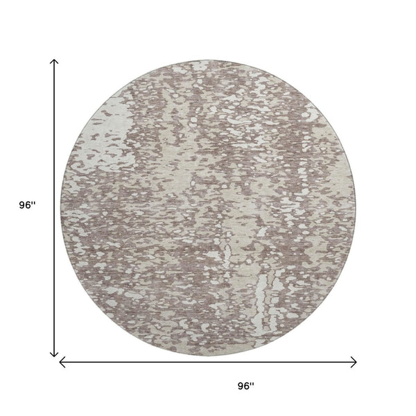 HomeRoots 8' Taupe and Ivory Abstract Round Rug - Washable, Stain-Resistant, UV Protected for Modern Spaces 675471