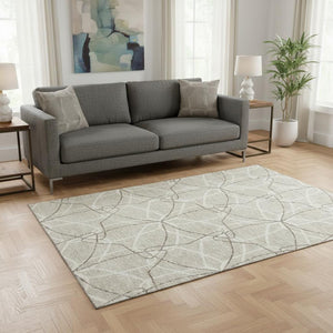 HomeRoots 5' X 8' Geometric Washable Area Rug in Beige, Ivory & Taupe – Durable, Stylish & UV Protected Design! 675482