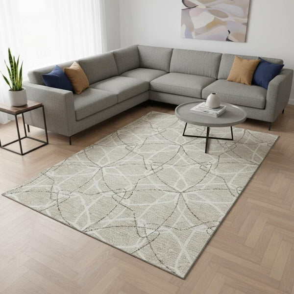 HomeRoots 9' X 12' Washable Beige Ivory Taupe Geometric Area Rug with UV Protection for High-Traffic Rooms 675485