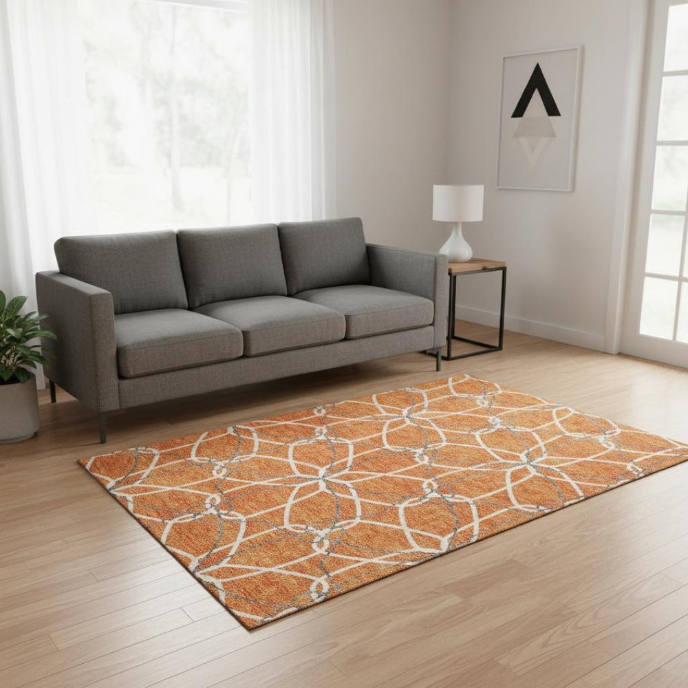 HomeRoots 5' X 8' Vibrant Orange Ivory Gray Geometric Washable Area Rug with UV Protection for Active Spaces 675524