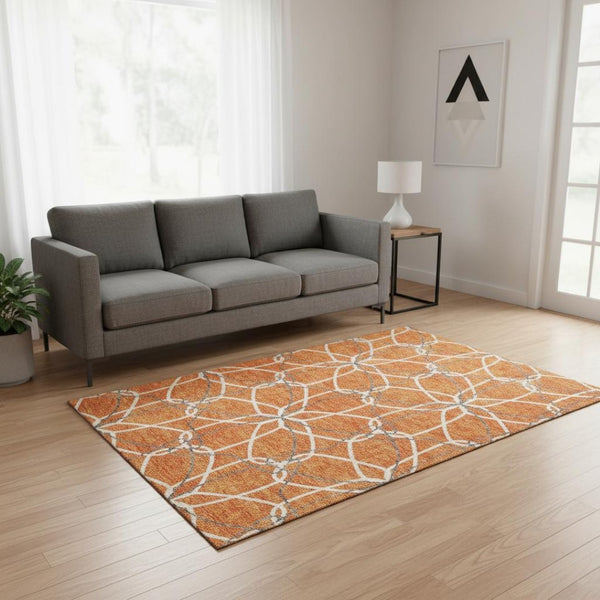 HomeRoots 5' X 8' Vibrant Orange Ivory Gray Geometric Washable Area Rug with UV Protection for Active Spaces 675524