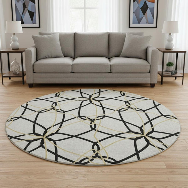 HomeRoots 8' Washable Round Rug in Bold White, Black & Gold Geometric Design - UV Protected & Durable Style 675555