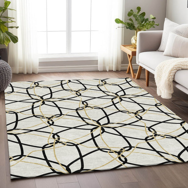 HomeRoots 9' X 12' Geometric Washable Area Rug - White, Black & Gold - UV Protected, Stylish & Durable Design 675557