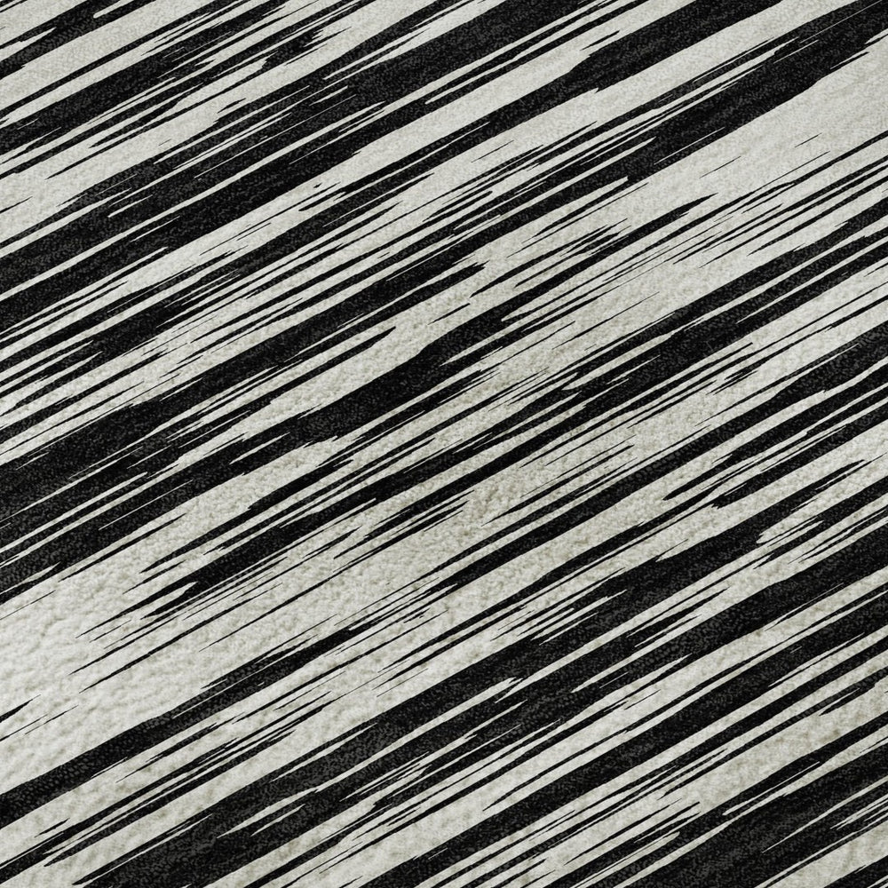 HomeRoots 5' X 8' Black and Ivory Striped Area Rug - Durable, Washable, UV Resistant for Busy Homes & Kids 675566