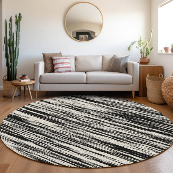 HomeRoots 8' Black and Ivory Striped Round Rug - Washable, UV Protected, Durable Design for Stylish Spaces 675567