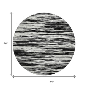 HomeRoots 8' Black and Ivory Striped Round Rug - Washable, UV Protected, Durable Design for Stylish Spaces 675567