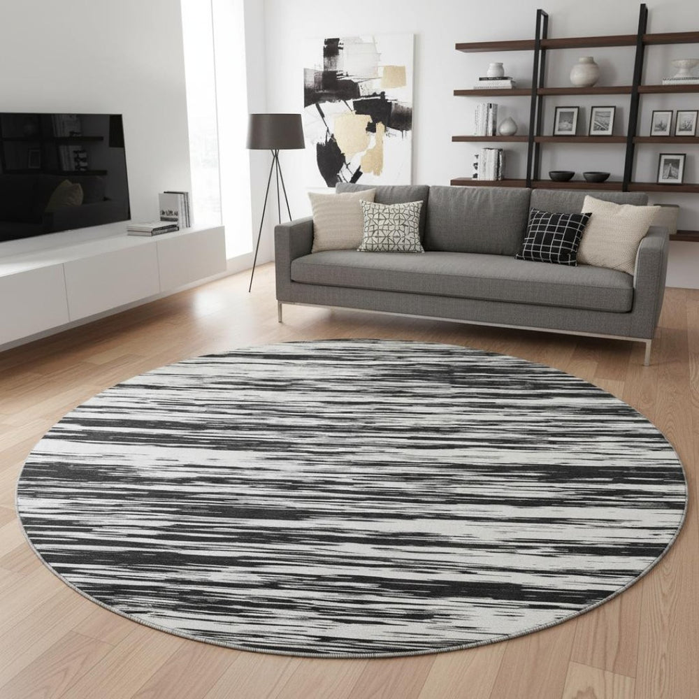 HomeRoots 8' Black and Ivory Striped Round Rug - Washable, UV Protected, Durable Design for Stylish Spaces 675567