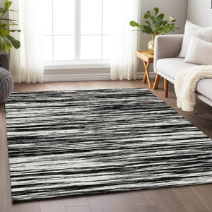 HomeRoots 9' X 12' Striped Black And Ivory Area Rug - Washable, UV Protected, Perfect For High-Traffic Spaces 675569