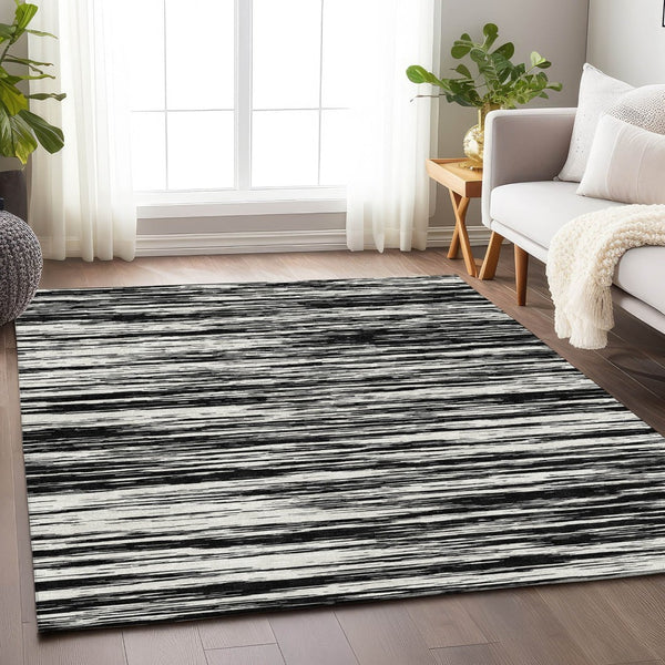HomeRoots 9' X 12' Striped Black And Ivory Area Rug - Washable, UV Protected, Perfect For High-Traffic Spaces 675569