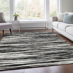 HomeRoots 9' X 12' Striped Black And Ivory Area Rug - Washable, UV Protected, Perfect For High-Traffic Spaces 675569