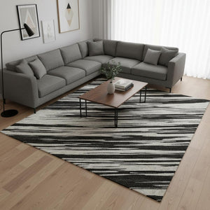 HomeRoots 10' X 14' Black and Ivory Striped Washable Area Rug - Durable, UV-Protected, Perfect for High-Traffic Spaces 675570