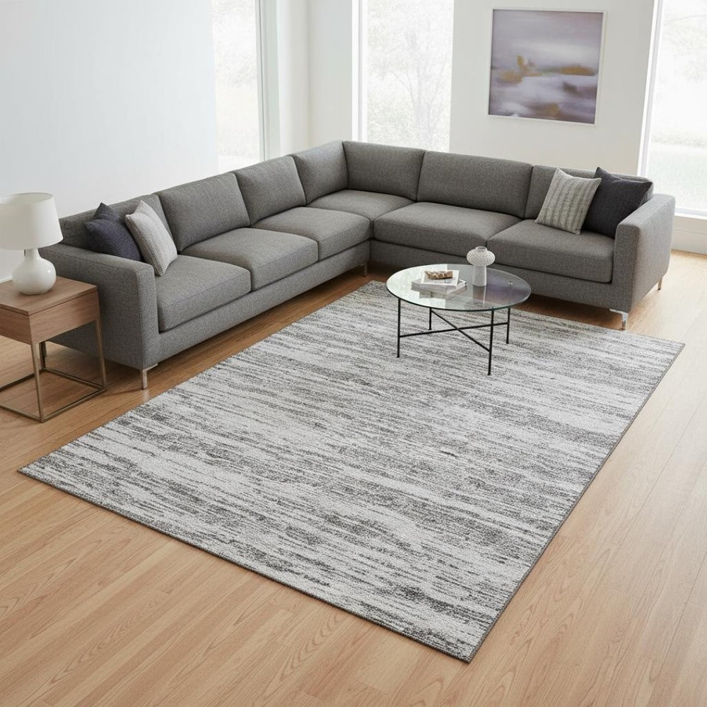 HomeRoots 9' X 12' Stylish Gray and Silver Striped Washable Area Rug with UV Protection for High-Traffic Spaces 675599