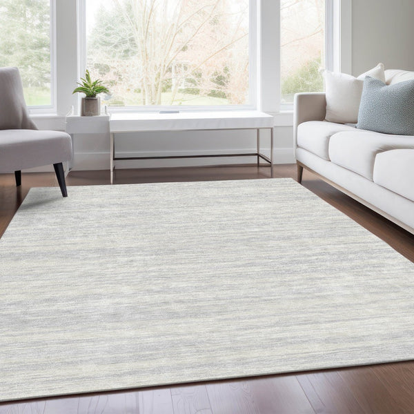 HomeRoots 9' X 12' Stylish Silver and Ivory Striped Washable Area Rug – UV Resistant, Durable & Easy Care! 675623