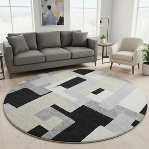 HomeRoots 8' Modern Black Ivory Beige Geometric Washable Round Area Rug with UV Protection for Easy Care 675693