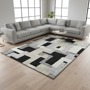 HomeRoots 8' X 10' Stylish Black Ivory Beige Geometric Washable Area Rug with UV Protection for Homes 675694