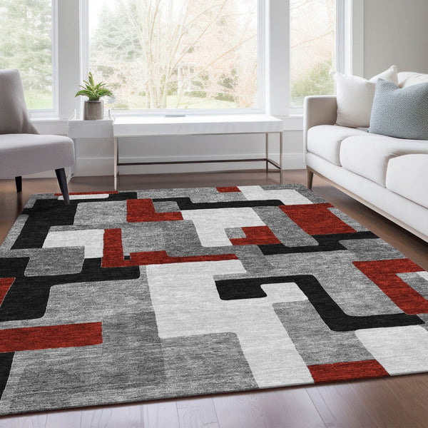 HomeRoots 9' X 12' Stylish Gray, Black & Red Geometric Washable Area Rug with UV Protection & Non-Slip Backing 675707