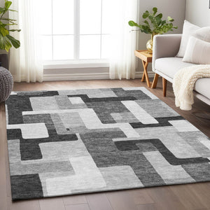 HomeRoots 5' X 8' Stylish Silver and Gray Geometric Washable Area Rug with UV Protection for High-Traffic Spaces 675734