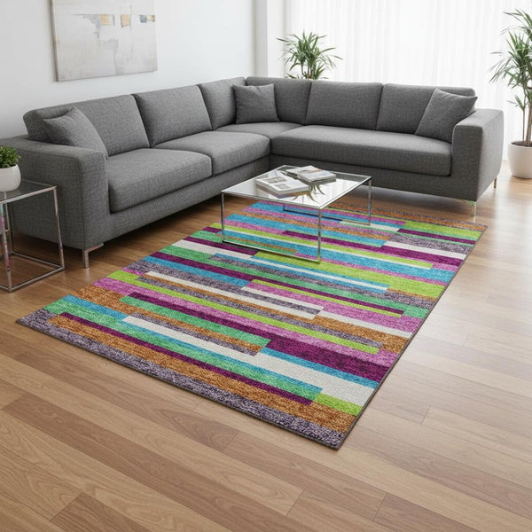 HomeRoots 10' Vibrant Striped Area Rug in Lavender, Orange & Lime Green – Washable, UV-Protected, Durable Design 675792