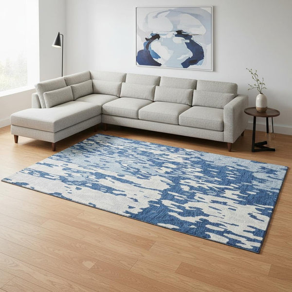 HomeRoots 8' X 10' Navy Blue And Ivory Abstract Area Rug - Washable, UV Protected, Modern Design for Easy Care 675850