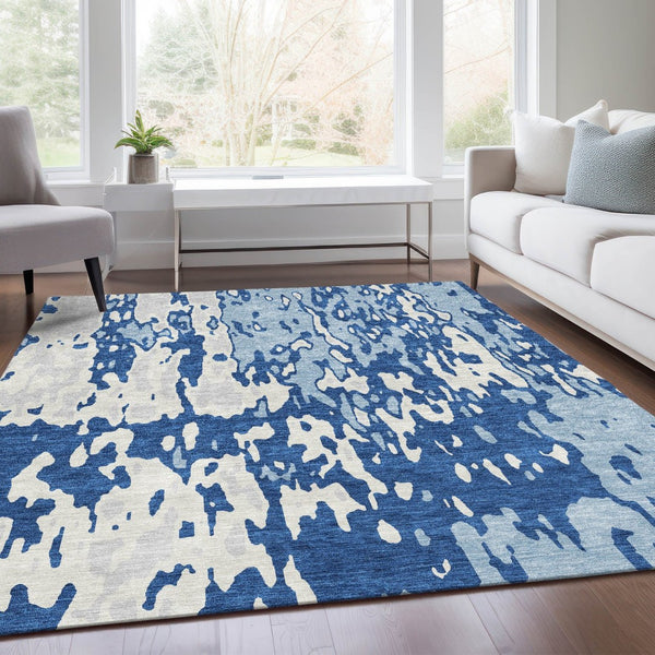 HomeRoots 8' X 10' Navy Blue And Ivory Abstract Area Rug - Washable, UV Protected, Modern Design for Easy Care 675850