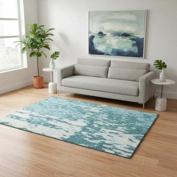 HomeRoots 5' X 8' Teal and Ivory Abstract Area Rug - Stylish, Washable, UV-Protected for Modern Homes & Pets 675878