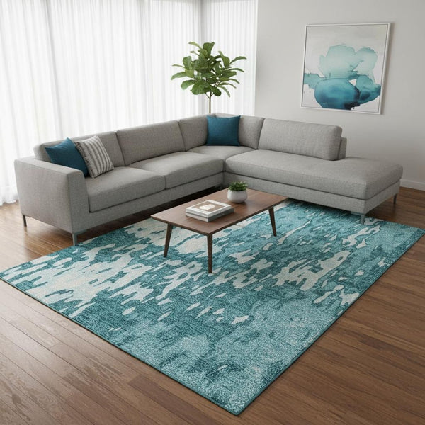 HomeRoots 9' X 12' Teal and Ivory Abstract Area Rug - Washable, Stain Resistant, UV Protected for Busy Homes 675881