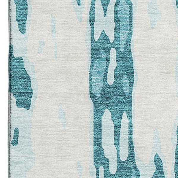 HomeRoots 10' Teal and Ivory Abstract Area Rug - Washable, Stain Resistant, UV Protected for Modern Spaces 675882