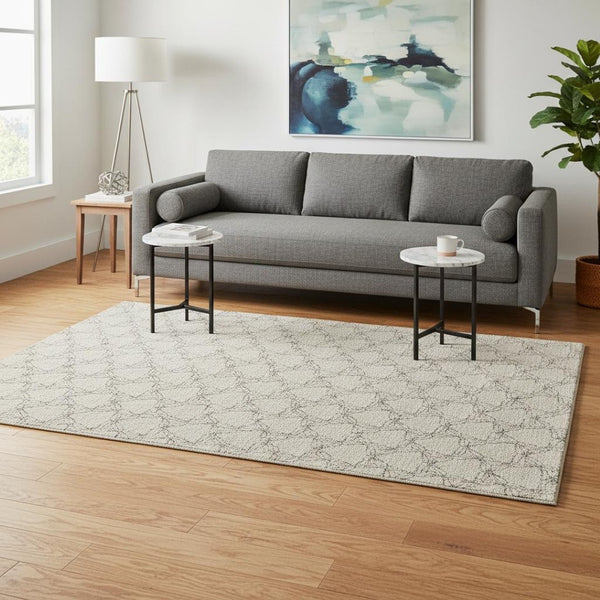HomeRoots 5' X 8' Beige And Brown Geometric Area Rug - Washable, UV Protected, Ideal for Family Spaces! 676034