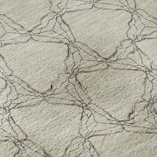 HomeRoots 8' Beige and Brown Geometric Round Rug – Washable, UV Protected, Stylish and Durable for Every Space! 676035