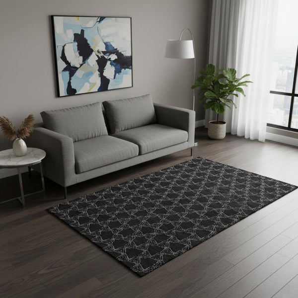 HomeRoots 5' X 8' Black And Ivory Geometric Area Rug – Washable, Stain Resistant, UV Protected for Family Homes 676040