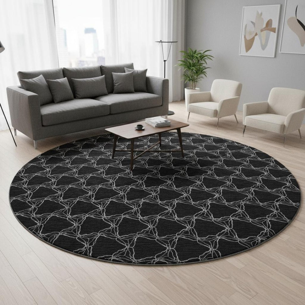 HomeRoots 8' Stylish Black and Ivory Geometric Round Rug – Washable, UV-Protected, Perfect for Busy Homes! 676041