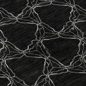 HomeRoots 8' Stylish Black and Ivory Geometric Round Rug – Washable, UV-Protected, Perfect for Busy Homes! 676041