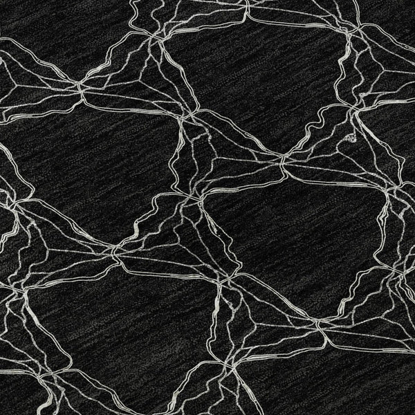 HomeRoots 8' Stylish Black and Ivory Geometric Round Rug – Washable, UV-Protected, Perfect for Busy Homes! 676041