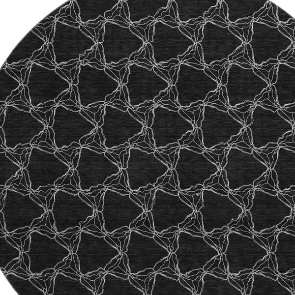 HomeRoots 8' Stylish Black and Ivory Geometric Round Rug – Washable, UV-Protected, Perfect for Busy Homes! 676041