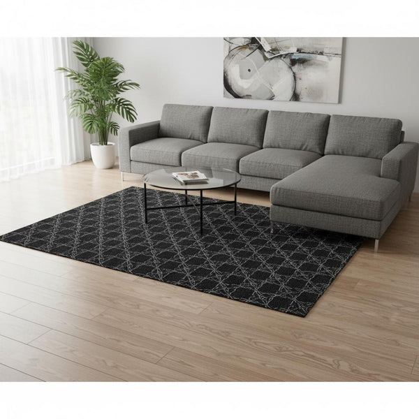 HomeRoots 8' X 10' Black And Ivory Geometric Area Rug – Washable, UV-Protected, Ideal for High-Traffic Spaces! 676042