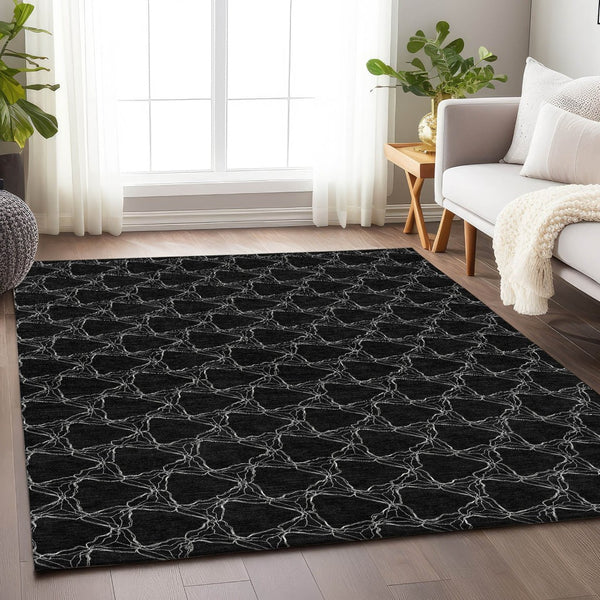 HomeRoots 9' X 12' Stunning Black and Ivory Geometric Area Rug - Washable, UV-Protected, Family-Friendly Design 676043