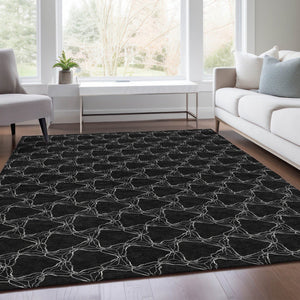 HomeRoots 9' X 12' Stunning Black and Ivory Geometric Area Rug - Washable, UV-Protected, Family-Friendly Design 676043