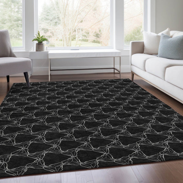 HomeRoots 9' X 12' Stunning Black and Ivory Geometric Area Rug - Washable, UV-Protected, Family-Friendly Design 676043