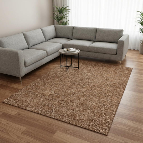HomeRoots 10' X 14' Stylish Rust and Ivory Geometric Washable Area Rug with UV Protection for Modern Spaces 676068