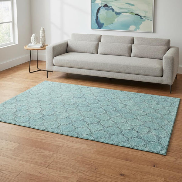 HomeRoots 5' X 8' Teal And Ivory Geometric Area Rug – Stylish, Washable, UV-Protected for High-Traffic Spaces 676088