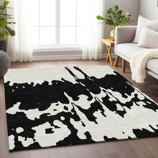 HomeRoots 5' X 8' Black And Ivory Abstract Area Rug - Washable, Stain Resistant, UV Protected for Versatile Spaces 676112