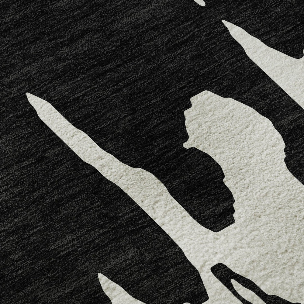 HomeRoots 5' X 8' Black And Ivory Abstract Area Rug - Washable, Stain Resistant, UV Protected for Versatile Spaces 676112