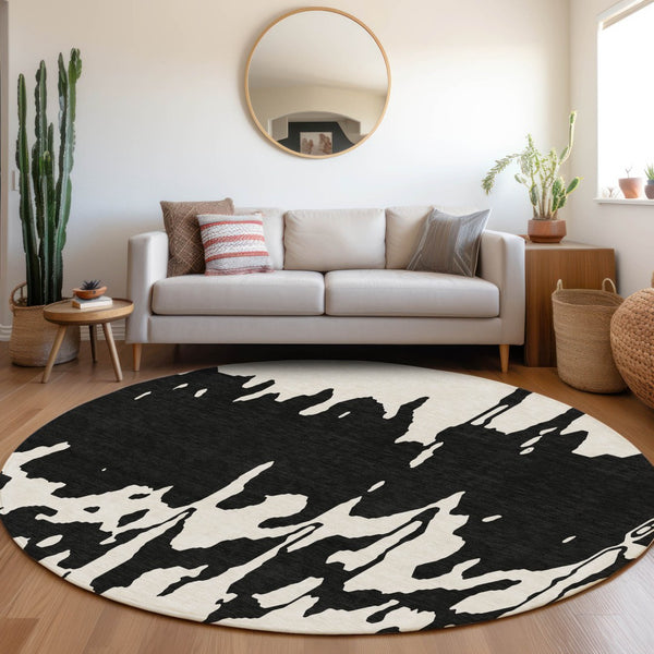 HomeRoots 8' Black And Ivory Abstract Round Rug - Washable, Stain-Resistant, UV Protected for Modern Spaces 676113