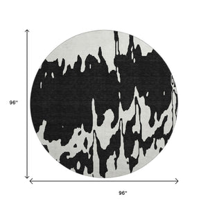 HomeRoots 8' Black And Ivory Abstract Round Rug - Washable, Stain-Resistant, UV Protected for Modern Spaces 676113