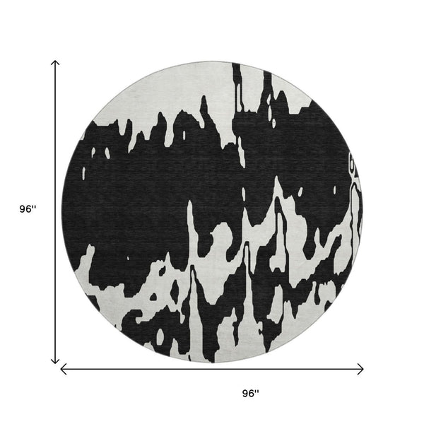 HomeRoots 8' Black And Ivory Abstract Round Rug - Washable, Stain-Resistant, UV Protected for Modern Spaces 676113
