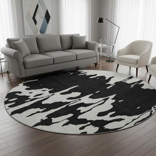 HomeRoots 8' Black And Ivory Abstract Round Rug - Washable, Stain-Resistant, UV Protected for Modern Spaces 676113
