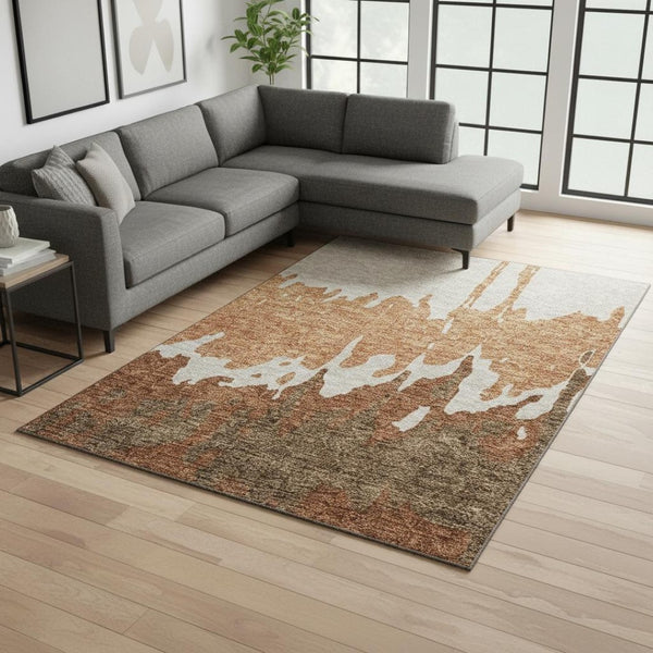 HomeRoots 9' X 12' Abstract Washable Area Rug in Rust, Beige & Brown - Durable, UV Protected & Stylish Design 676139